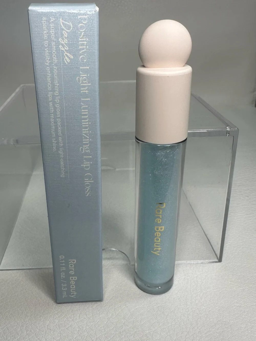 Rare Beauty Positive Light Luminizing Lip Gloss — Shimmering Blue